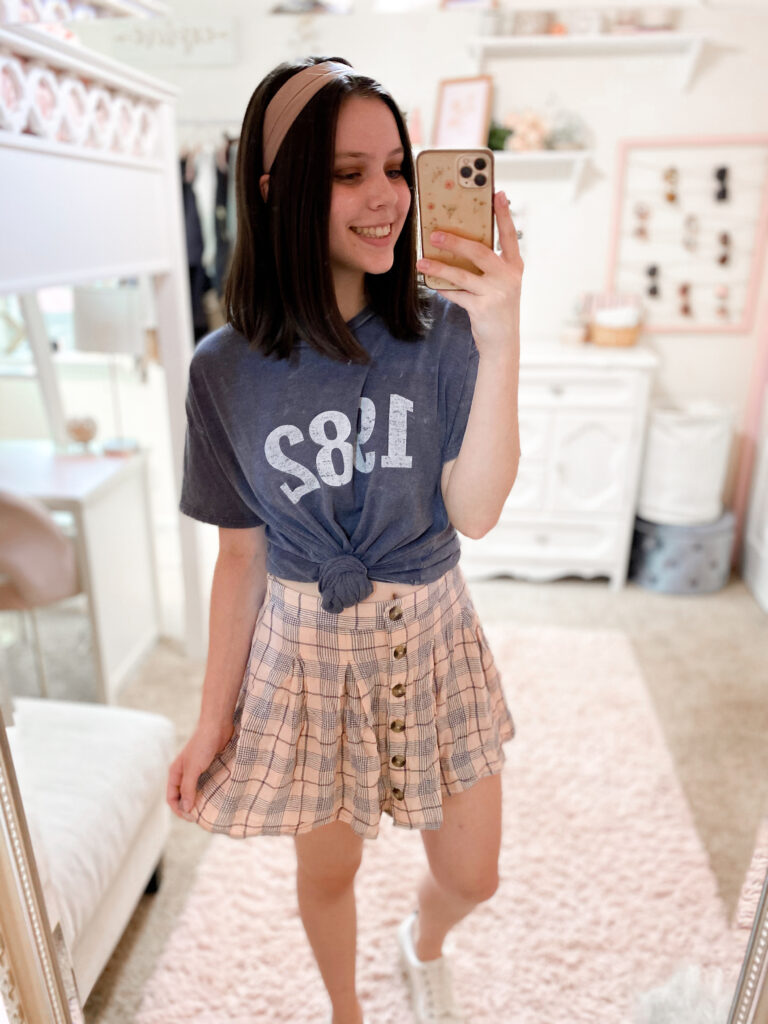 skirt and graphic tee